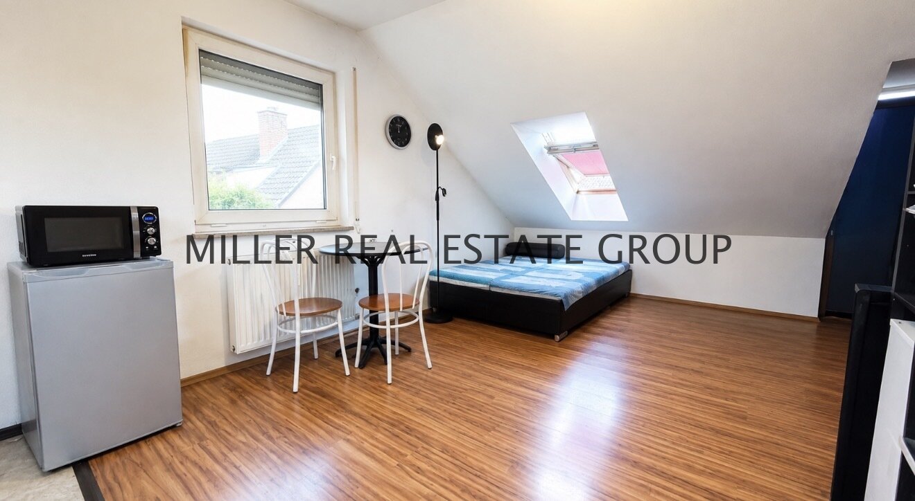 Wertstabile Kapitalanlage in Ingolstadt-Friedrichshofen: Vermietetes Dachgeschoss-Apartment mit Tiefgaragenstellplatz in ruhiger zweiter Reihe!