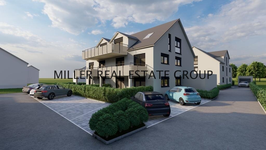 Neubau: Großzügige Wohnung mit Garten, Lift und Einzelgarage!