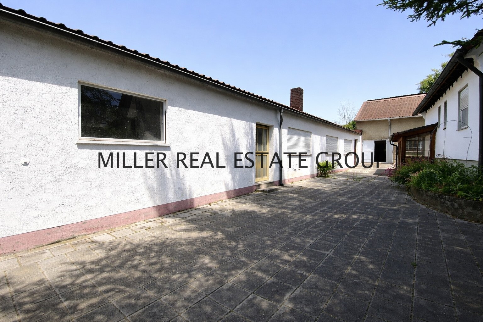 Einfamilienhaus (ca. 135 m²) und 216 m² Lagerhalle & Werkstatt – Wohnen & Arbeiten perfekt kombiniert!