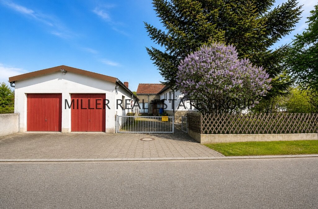 Wohnen & Arbeiten im Grünen: Einfamilienhaus mit ca. 216 m² Lagerhalle, Werkstatt und großem Grundstück!