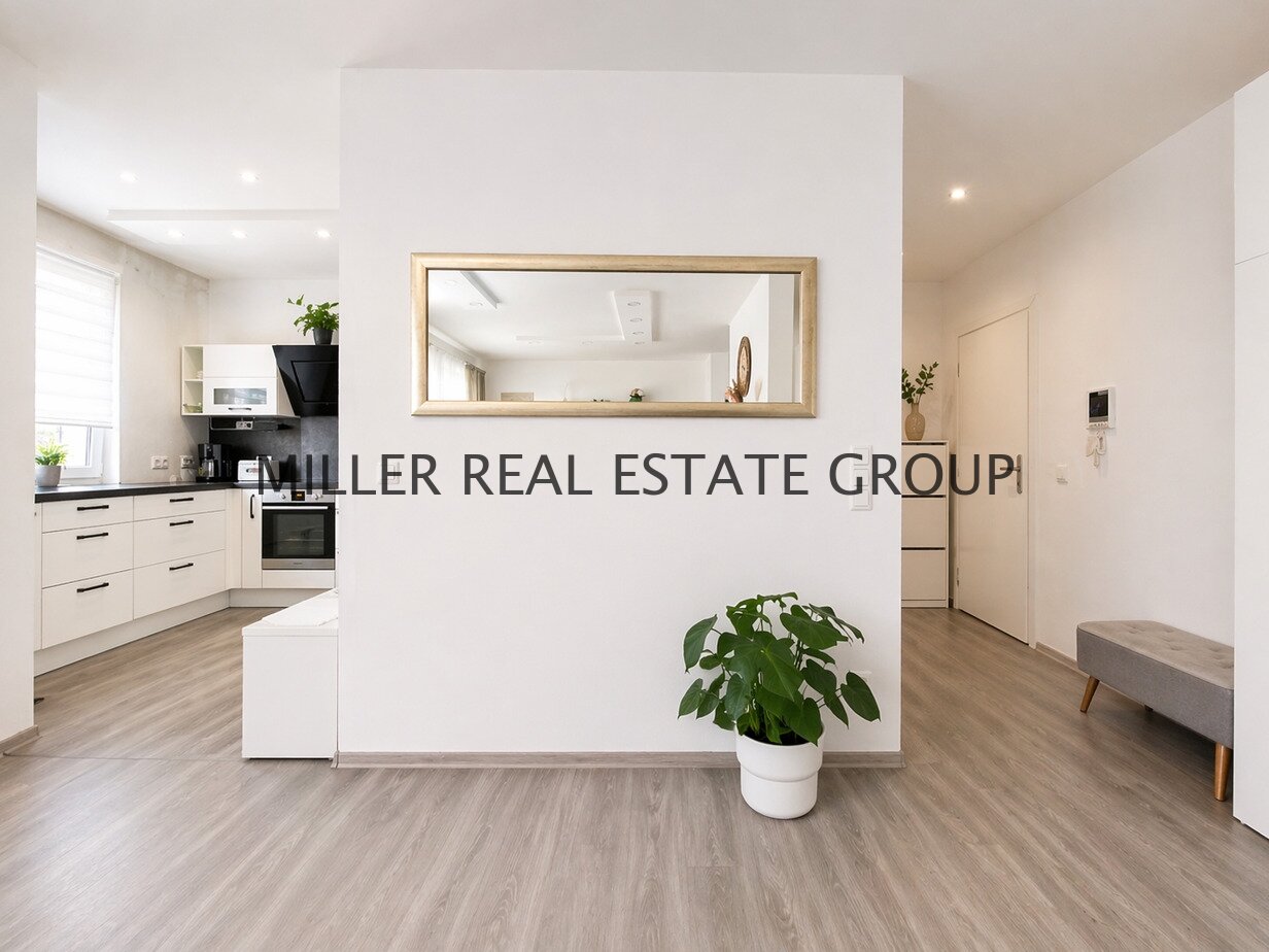 Moderne 4-Zimmer-Erdgeschosswohnung mit Privatgarten, Terrasse & zwei Tiefgaragenstellplätzen!