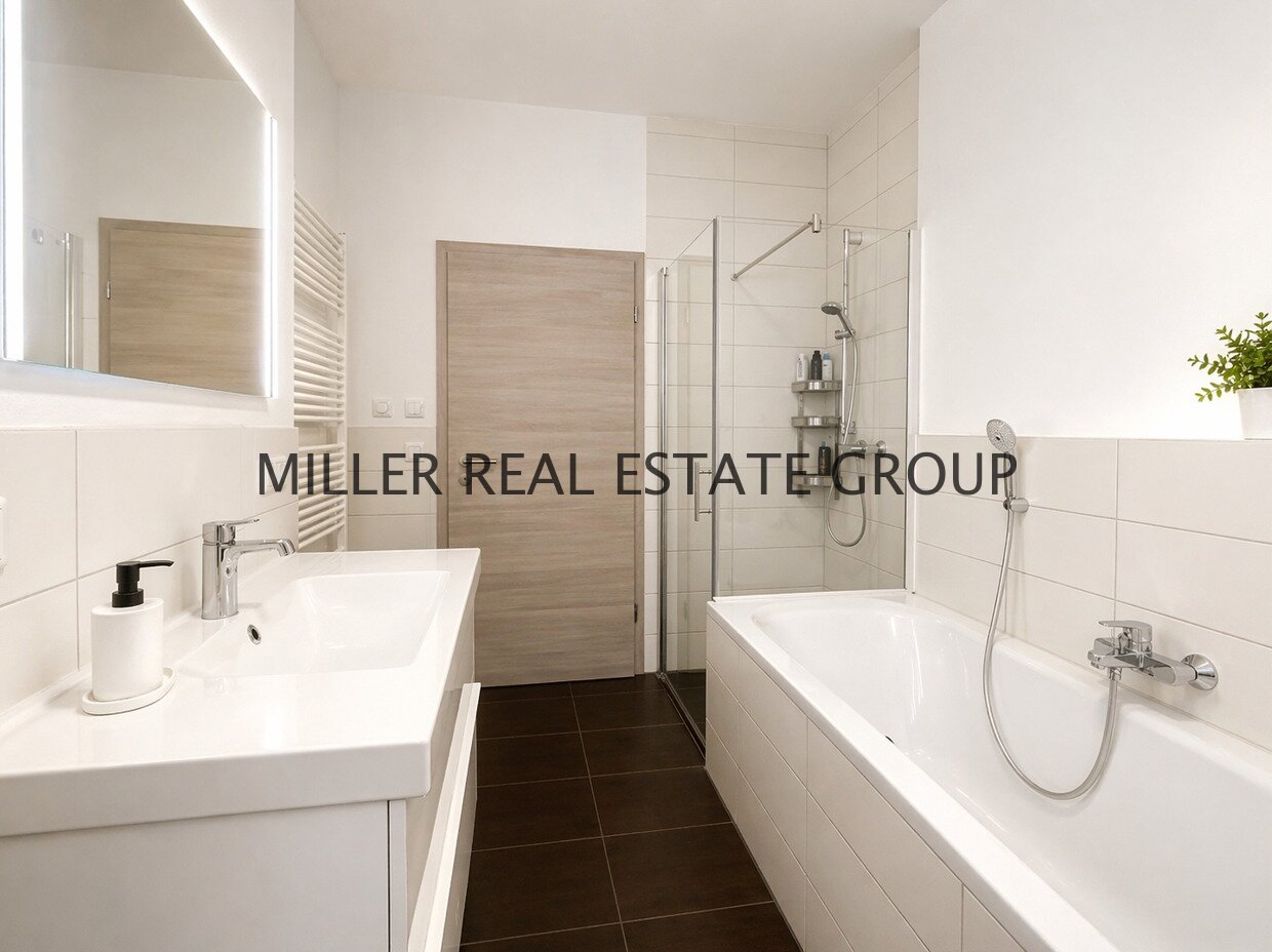 Moderne 4-Zimmer-Erdgeschosswohnung mit Privatgarten, Terrasse & zwei Tiefgaragenstellplätzen!