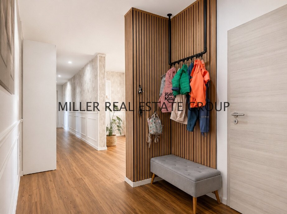 Moderne 4-Zimmer-Erdgeschosswohnung mit Privatgarten, Terrasse & zwei Tiefgaragenstellplätzen!