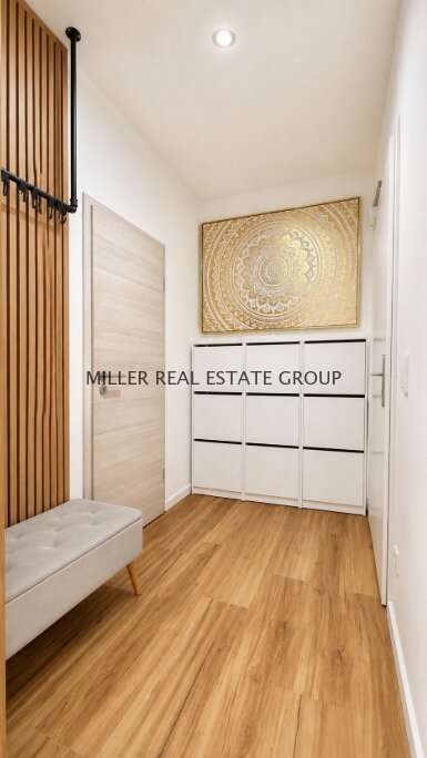 Moderne 4-Zimmer-Erdgeschosswohnung mit Privatgarten, Terrasse & zwei Tiefgaragenstellplätzen!